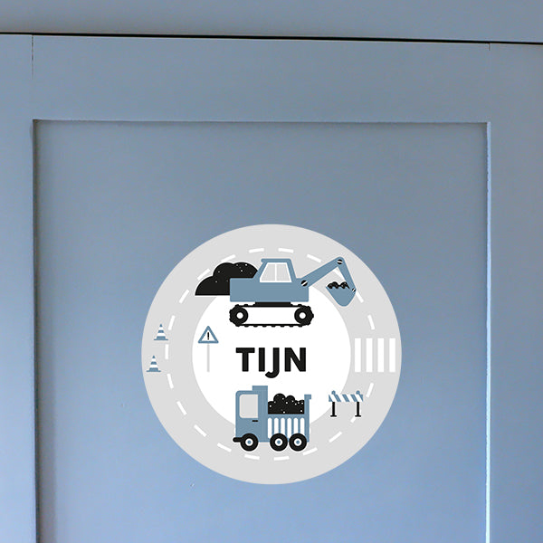 Deursticker rond Graafmachine met naam - jeans blauw