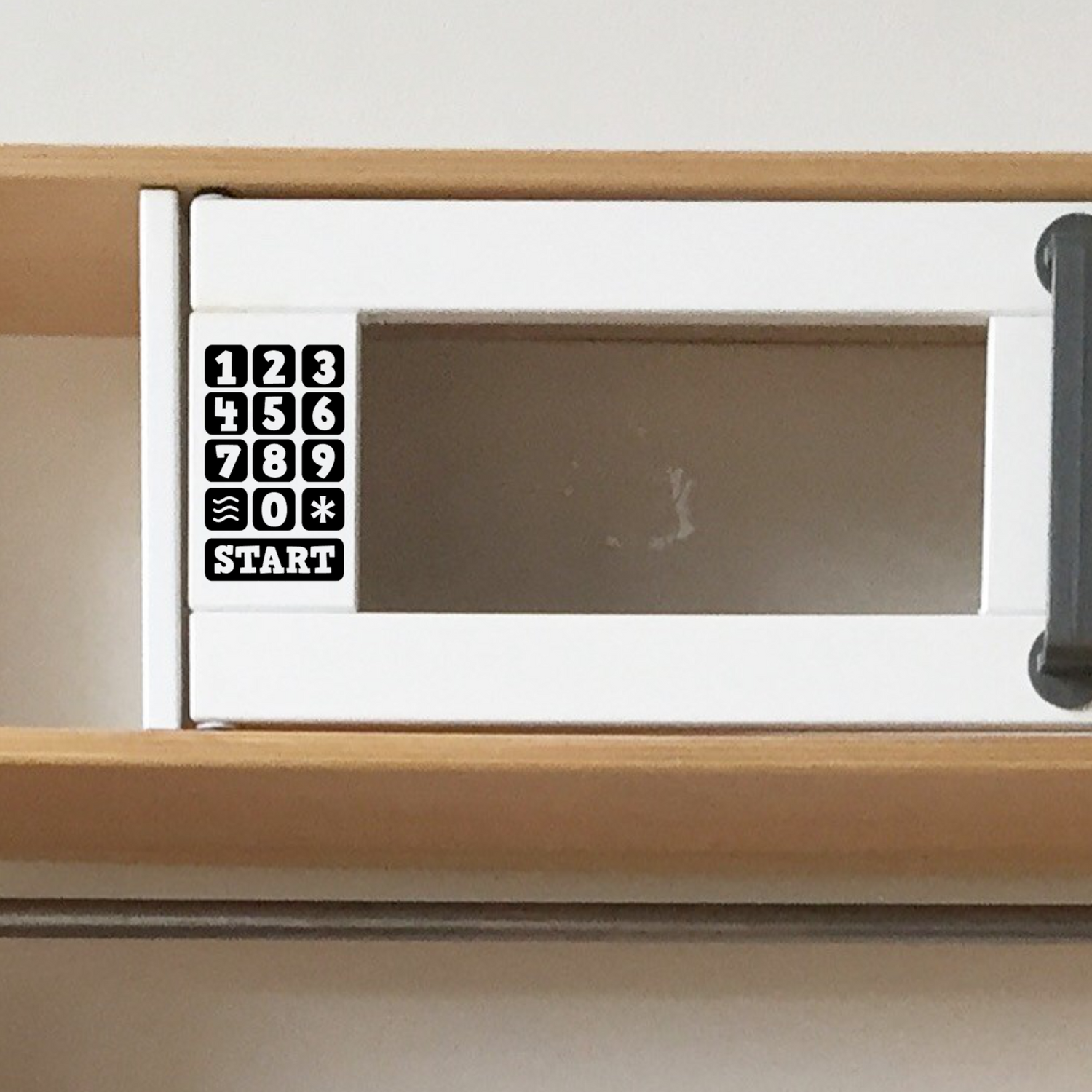 Ikea keukentje sticker magnetron knopjes