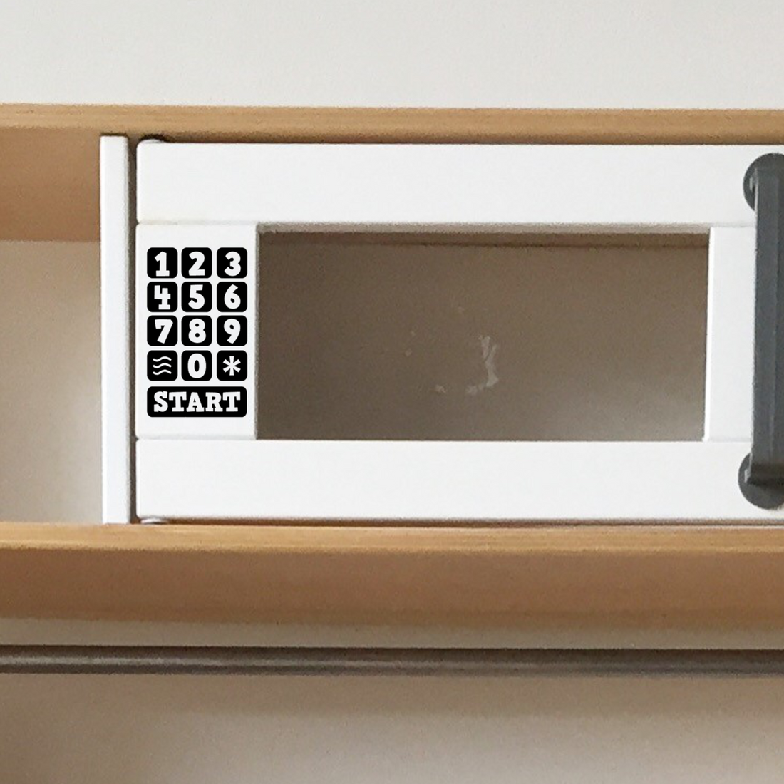 Ikea keukentje sticker magnetron knopjes (zwart)